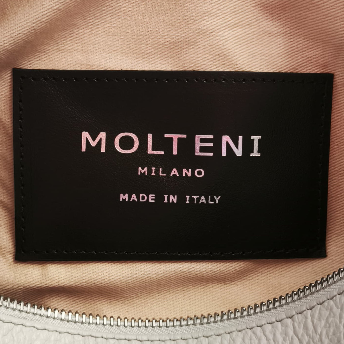 Targhetta interna MOLTENI MILANO su NORA small grigia