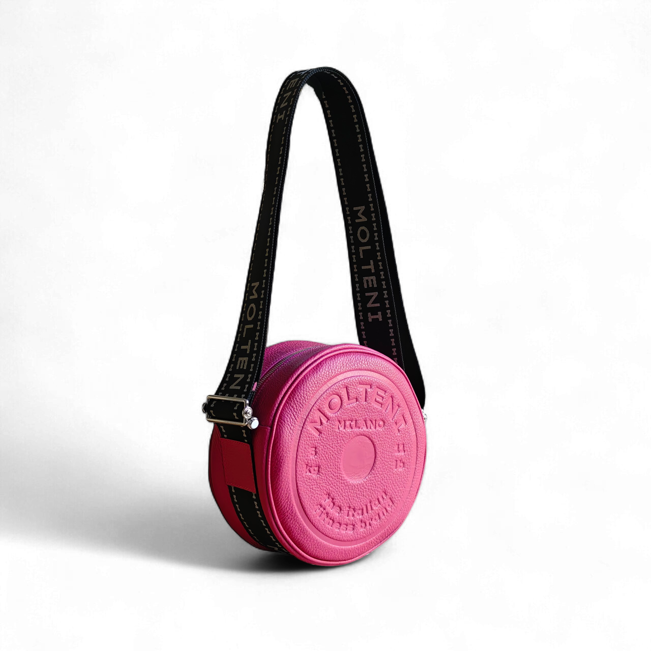 Borsa in pelle ELEO Medium pink Molteni Milano vista tre quarti, design ispirato al disco peso fitness, elegante e strutturata